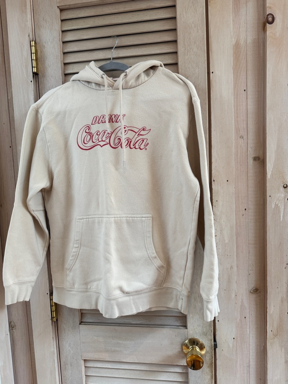 Coca-Cola Store Cream Hoodie Red Logo. Polar bear graphic on back Size Large HTF
